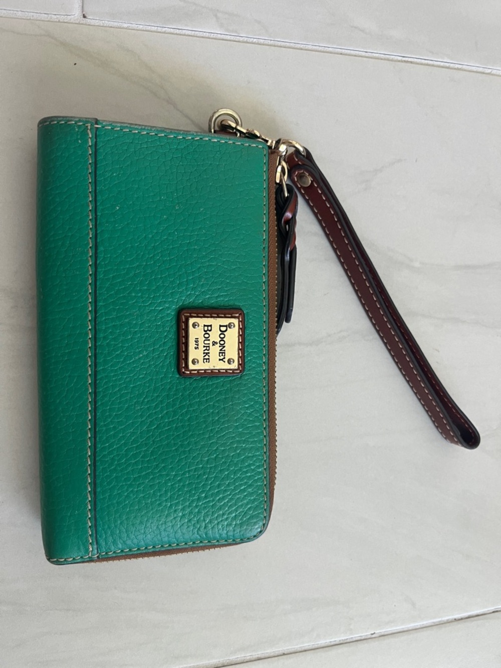 Dooney & Bourke Teal Pebbled Leather Wristlet Wallet with Brown Strap